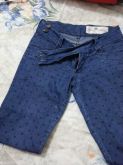 Calça Jeans com Póa